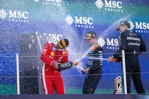 ESP, MSC Cruises Grand Prix of Barcelona Catalunya, Race, Formula 1 World Championship Season 2026 14 06 2026, Circuit de Barcelona Catalunya, Barcelona, ESP, MSC Cruises Grand Prix of Barcelona Catalunya, Race, Formula 1 World Championship Season 2026, pictured Lewis Hamilton Scuderia Ferrari HP, Great Britain, 44 celebrates his first victory with Ferrari on the podium at the podium ceremony and sprays champagne with Lando Norris McLaren Mastercard Formula 1 Team, Great Britain, 01 , George Russell Mercedes AMG Petronas F1 Team, Great Britain, 63 , nordphotoxGmbHx xMemmler nph00005