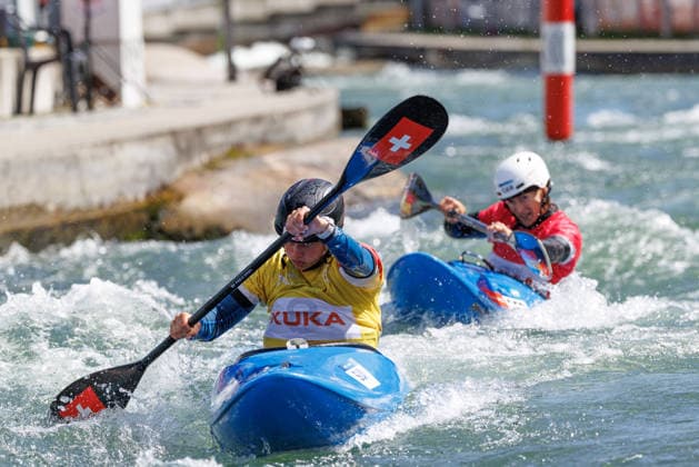 Tereza Kneblova CZE , Evy Leibfarth USA , Alena Marx SUI , Ricarda Funk GER at ICF CANOE SLALOM WORLD CUP, Canoeing, Women, Kayak Cross, 2026, on 14 06 2026 in Augsburg, Eiskanal Bayern Germany