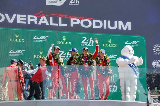 24 HEURES DU MANS 2026 - PODIUM 07 CONWAY Mike (gbr), KOBAYASHI Kamui (jpn), DE VRIES Nyck (nld), Toyota Racing, Toyota TR010 Hybrid 07, Hypercar, podium, during the podium of the 24 Hours of Le Mans 2026, 3rd round of the 2026 FIA World Endurance Championship, on June 14, 2026 on the Circuit des 24 Heures du Mans in Le Mans, France - Le MansFrance  Copyright: xFREDERICxLExFLOCxHx