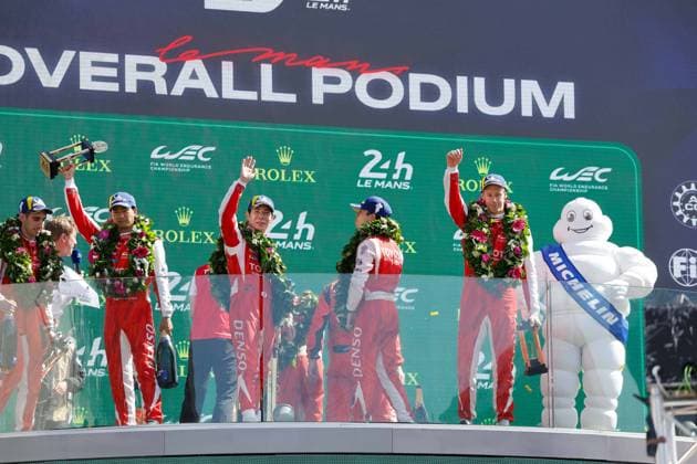24 HEURES DU MANS 2026 - PODIUM 07 CONWAY Mike (gbr), KOBAYASHI Kamui (jpn), DE VRIES Nyck (nld), Toyota Racing, Toyota TR010 Hybrid 07, Hypercar, podium, during the podium of the 24 Hours of Le Mans 2026, 3rd round of the 2026 FIA World Endurance Championship, on June 14, 2026 on the Circuit des 24 Heures du Mans in Le Mans, France - Le MansFrance  Copyright: xFREDERICxLExFLOCxHx