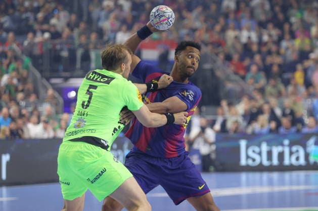 14 06 2026, xtgx, Handball, EHF Champions League Final, FC Barcelona Füchse Berlin v l Max Darj Berlin, 5 , Timothey N guessan N guessan, Barcelona, 19 duel, duel, fight, tackle Koeln