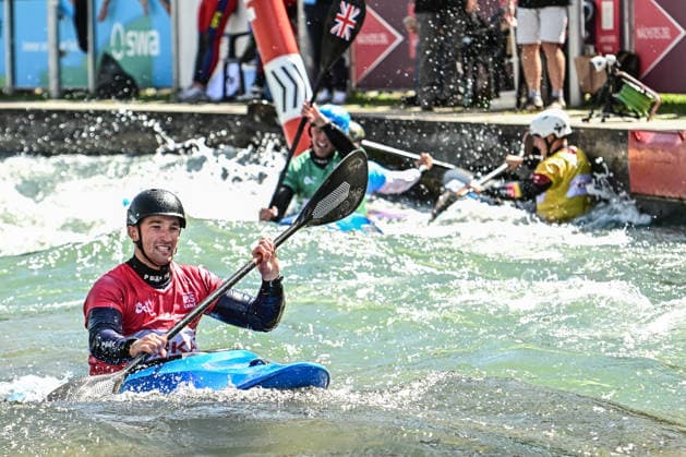 ICF Canoe Slalom World Cup 14 06 2026, Eis Kanal, Augsburg Lucien Delfour was the first to cross the finish line but was disqualified, Augsburg, 14 06 2026 Canoe World Cup, Kayak Cross Elimination, Augsburg, Eis Kanal Copyright: xBEAUTIFULxSPORTS Märklx