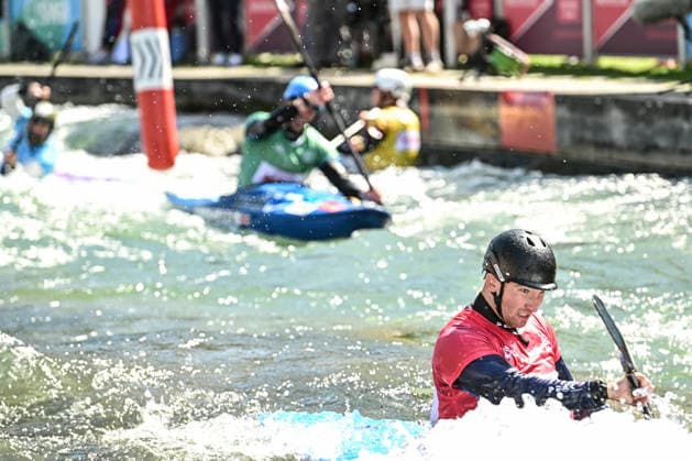 ICF Canoe Slalom World Cup 14 06 2026, Eis Kanal, Augsburg Lucien Delfour was the first to cross the finish line but was disqualified, Augsburg, 14 06 2026 Canoe World Cup, Kayak Cross Elimination, Augsburg, Eis Kanal Copyright: xBEAUTIFULxSPORTS Märklx