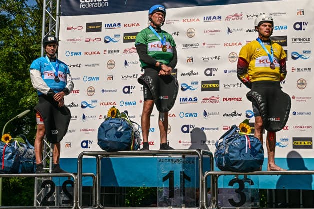 ICF Canoe Slalom World Cup 14 06 2026, Eis Kanal, Augsburg Winner Men™s Kayak Corss from left 2nd place David Llorente ESP , 1st place Joseph Clarke GBR , 3rd place Gabriel de Coster BEL , Augsburg, 14 06 2026 Canoe World Cup, Augsburg, Eis Kanal Copyright: xBEAUTIFULxSPORTS Märklx