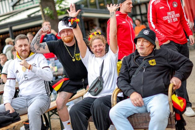 14 06 2026, Cologne, Public Viewing for the FIFA World Cup 2026, international match World Cup Germany Curacao, fans in the beer garden look forward to the game and cheer for the goal the victory of the German national team North Rhine-Westphalia Germany