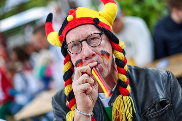 14 06 2026, Cologne, Public Viewing for the FIFA World Cup 2026, international match World Cup Germany Curacao, fans in the beer garden look forward to the game and cheer for the goal the victory of the German national team North Rhine-Westphalia Germany