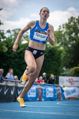 MANNHEIM, GERMANY - JUNE 14, 2026 : Milla Tonazzi (SUI Switzerland) competing in the women’s 200m during the Juniorengala 2026 at Michael-Hoffmann-Stadion on June 14, 2026 in Mannheim, Germany. Baden-Wuerttemberg Germany Copyright: xAxelxKohringx