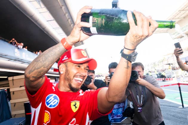 June 14, 2026, Garnolles, Spain: LEWIS HAMILTON (GBR) of Scuderia Ferrari 44 celebrating his first victory with Ferrari with champagne on race day of the 2026 Formula 1 Catalunya Spanish Grand Prix. F1 2026: Barcelona Grand Prix: Race Day  - ZUMAb177 20260614_aap_b177_042 Copyright: xTaidghxBarronx
