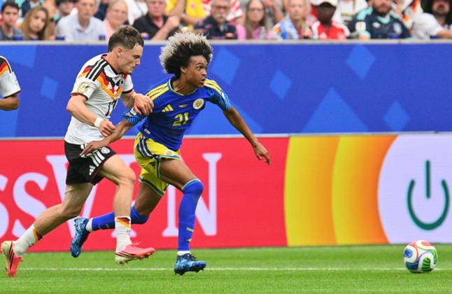 FIFA World Cup, WM, Weltmeisterschaft, Fussball 2026 - Group E - Germany vs Curacao Florian Wirtz of Germany (L) and Tahith Chong of Curacao in action during the FIFA World Cup 2026 group stage match Germany against Curacao, in Houston, USA, 14 June 2026. HOUSTON United States  Copyright: xSAMxWASSONx