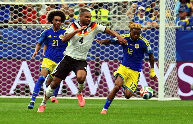 FIFA World Cup, WM, Weltmeisterschaft, Fussball 2026 - Group E - Germany vs Curacao Jonathan Tah of Germany (C) and Sontje Hansen of Curacao in action during the FIFA World Cup 2026 group stage match Germany against Curacao, in Houston, USA, 14 June 2026. HOUSTON United States  Copyright: xSAMxWASSONx