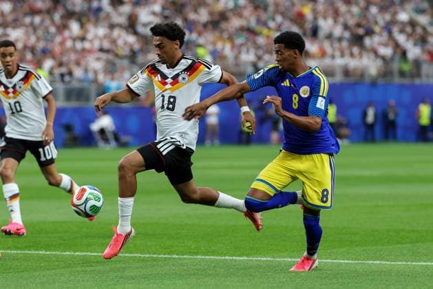 in duel, action, with Nathaniel Brown 18 Germany , Livano Comenencia 8 Curacao , Germany vs Curacao, Soccer, World Cup 2026, Group stage, 14 06 2026 Houston Texas USA Copyright: xkolbert-press ChristianxKolbertx