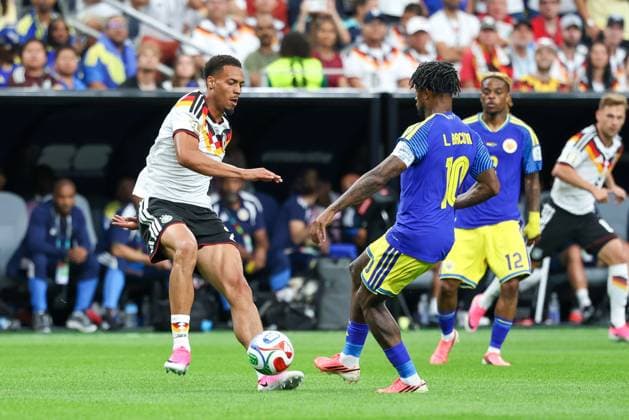 in duel, action, with Felix Nmecha 23 Germany , Leandro Bacuna 10 Curacao , Germany vs Curacao, Soccer, World Cup 2026, Group stage, 14 06 2026 Houston Texas USA Copyright: xkolbert-press ChristianxKolbertx