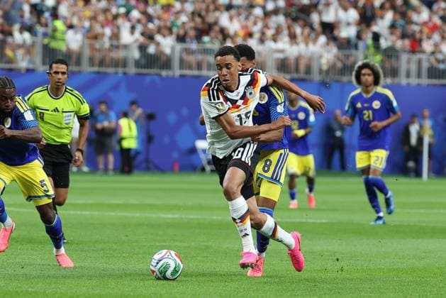 in duel, action, with Jamal Musiala 10 Germany , Germany vs Curacao, Soccer, World Cup 2026, Group stage, 14 06 2026 Houston Texas USA Copyright: xkolbert-press ChristianxKolbertx