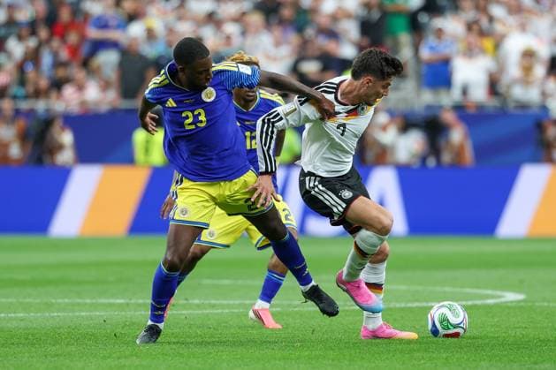 in duel, action, with Riechedly Bazoer 23 Curacao , Kai Havertz 7 Germany , Germany vs Curacao, Soccer, World Cup 2026, Group stage, 14 06 2026 Houston Texas USA Copyright: xkolbert-press ChristianxKolbertx