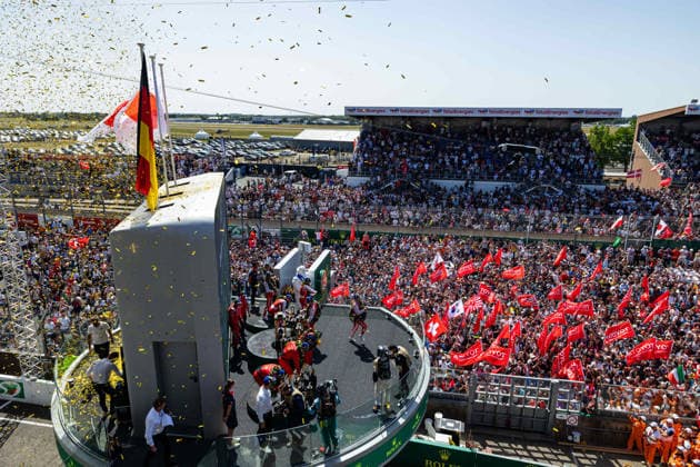 24 HEURES DU MANS 2026 - PODIUM 07 CONWAY Mike (gbr), KOBAYASHI Kamui (jpn), DE VRIES Nyck (nld), Toyota Racing, Toyota TR010 Hybrid 07, Hypercar, 20 FRIJNS Robin (nld), RAST RenÃ (ger), VAN DER LINDE Sheldon (zaf), BMW M Team WRT, BMW M Hybrid V8 20, Hypercar, 08 BUEMI SÃ bastien (swi), HARTLEY Brendon (nzl), HIRAKAWA Ryo (jpn), Toyota Racing, Toyota TR010 Hybrid 08, Hypercar, portrait during the podium of the 24 Hours of Le Mans 2026, 3rd round of the 2026 FIA World Endurance Championship, on June 14, 2026 on the Circuit des 24 Heures du Mans in Le Mans, France -  Copyright: xGERMAINxHAZARDx