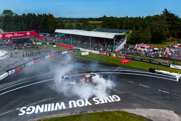 REPRO FREE *PRESS RELEASE NO REPRODUCTION FEE* EDITORIAL USE ONLY Red Bull Drift Masters, Mondello Park 14 6 2026 Thousands turned out for Red Bull Drift Masters and Red Bull Drift Pursuit at Mondello Park this weekend, with fans treated to two days of tyre-smoking drifting action. Conor Shanahan finished in the Top 32 of Red Bull Drift Masters, leaving the Cork driver second overall in the championship standings following the Irish round. Red Bull Drift Pursuit also featured as part of the weekend, with the top four drivers earning wildcard entries into Drift Masters qualifying alongside some of the Ä™s biggest names. Pictured is a view of the Red Bull Drift Masters A view of the Red Bull Drift Masters 14 6 2026  Copyright: x INPHO RedxBullxContentxPool MihaixStetcux MS_20260614_RED_BULL_DRIFT_MASTERS_