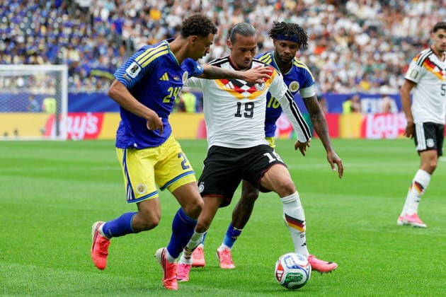 Deveron Fonville Curacao and Leroy Sane Germany battle for the ball during the FIFA World Cup 2026 Group E match between Germany and Curacao at Houston Stadium on June 14, 2026 in Houston, United States Photo by Torbjorn Tande DeFodi Images