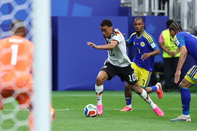 HOUSTON, TX - JUNE 14: Jamal Musiala 10 of Germany controls the ball in the box while being defended by Juninho Bacuna 7 of Curacao during the FIFA World Cup, WM, Weltmeisterschaft, Fussball 2026 Group E match between Germany and Curacao on June 14, 2026, at Houston Stadium in Houston, Texas. (Photo by David Buono Icon Sportswire) SOCCER: JUN 14 FIFA World Cup 26 Group E - Germany vs Curacao EDITORIAL USE ONLY Icon260614023