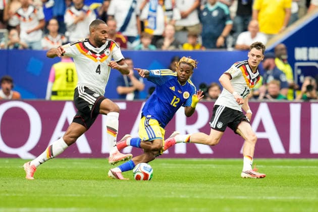 Jonathan Tah Germany, 4 , Sontje Hansen Curacao, 12 , and Florian Wirtz Germany, 17 USA, FIFA World Cup, Germany vs Curacao, Houston, 14 06 2026 USA, FIFA World Cup, Germany vs Curacao, Houston, 14 06 2026 Houston Copyright: xEibner-Pressefoto ScottxColemanx EP_SCN