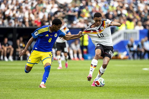Jamal Musiala of Germany (R) and Livano Comenencia of Curacao (L) fight for possession during the FIFA World Cup, WM, Weltmeisterschaft, Fussball 2026 Group E match between Germany and Curacao at Houston Stadium on June 14th,2026 (Photo by Joao Bravo Sports Press Photo)  Copyright: xJoaoxBravo SportsxPressxPhotox Sportspressphoto_SPR166357