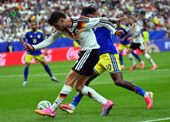 FIFA World Cup, WM, Weltmeisterschaft, Fussball 2026 - Group E - Germany vs Curacao Kai Havertz of Germany (C) and Leandro Bacuna of Curacao (R) in action during the FIFA World Cup 2026 group stage match Germany against Curacao, in Houston, USA, 14 June 2026. HOUSTON United States  Copyright: xSAMxWASSONx
