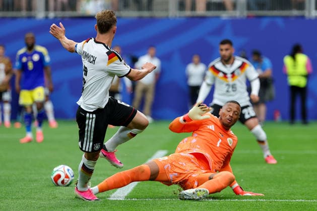Joshua Kimmich Germany and goalkeeper Manuel Neuer Germany battle for the ball during the FIFA World Cup 2026 Group E match between Germany and Curacao at Houston Stadium on June 14, 2026 in Houston, United States Photo by Torbjorn Tande DeFodi Images