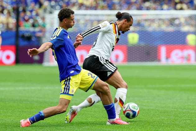 Deveron Fonville Curacao and Leroy Sane Germany battle for the ball during the FIFA World Cup 2026 Group E match between Germany and Curacao at Houston Stadium on June 14, 2026 in Houston, United States Photo by Torbjorn Tande DeFodi Images