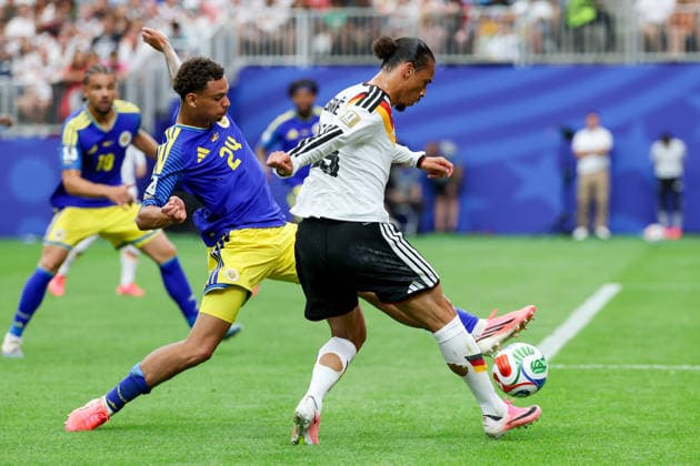 Deveron Fonville Curacao and Leroy Sane Germany battle for the ball during the FIFA World Cup 2026 Group E match between Germany and Curacao at Houston Stadium on June 14, 2026 in Houston, United States Photo by Torbjorn Tande DeFodi Images