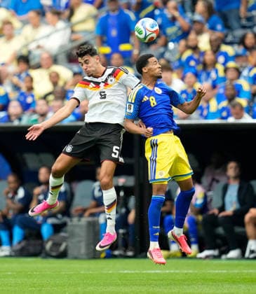 Aleksandar Pavlovic Germany, 5 rises high against Livano Comenencia Curacao, 8 for header USA, FIFA World Cup, Germany vs Curacao, Houston, 14 06 2026 USA, FIFA World Cup, Germany vs Curacao, Houston, 14 06 2026 Houston Copyright: xEibner-Pressefoto ScottxColemanx EP_SCN