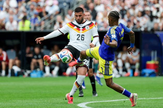 Deniz Undav Germany and Juninho Bacuna Curacao battle for the ball during the FIFA World Cup 2026 Group E match between Germany and Curacao at Houston Stadium on June 14, 2026 in Houston, United States Photo by Torbjorn Tande DeFodi Images