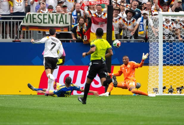 Soccer, Men, FIFA World Cup 2026 in Mexico, Canada and USA, Match in Houston Group E, Matchday 1 , Germany Curacao, f l Kai Havertz Germany scores the goal for 7 1 against Armando Obispo Curacao and goalkeeper Eloy Room Curacao , 14 06 2026, Copyright: xMatthiasxKochx