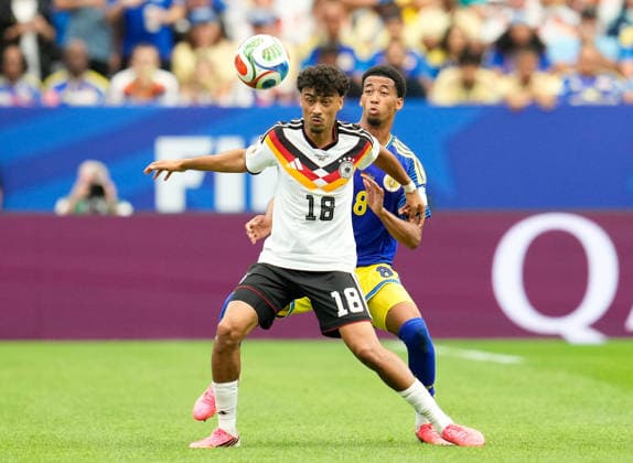 Nathaniel Brown Germany, 18 in duel with Livano Comenencia Curacao, 8 USA, FIFA World Cup, Germany vs Curacao, Houston, 14 06 2026 USA, FIFA World Cup, Germany vs Curacao, Houston, 14 06 2026 Houston Copyright: xEibner-Pressefoto ScottxColemanx EP_SCN