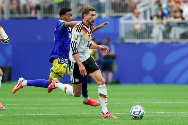 Leon Goretzka Germany and Livano Comenecia Curacao battle for the ball during the FIFA World Cup 2026 Group E match between Germany and Curacao at Houston Stadium on June 14, 2026 in Houston, United States Photo by Torbjorn Tande DeFodi Images