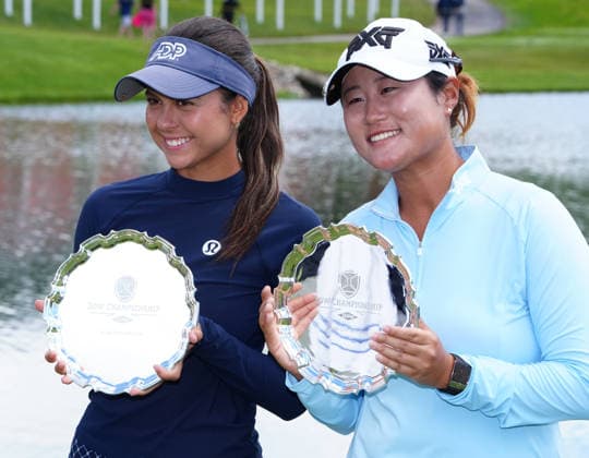MIDLAND, MI - JUNE 14: From left to right LPGA, Golf Damen golfers Yana Wilson and Gina Kim pose with the trophies on June 14, 2026, after winning the LPGA Dow Championship at Midland Country Club in Midland, Michigan. (Photo by Brian Spurlock Icon Sportswire) GOLF: JUN 14 LPGA Dow Championship EDITORIAL USE ONLY Icon26061461