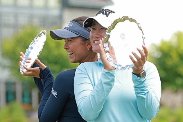 Dow Championship MIDLAND, MICHIGAN - JUNE 14: Yana Wilson (back) and Gina Kim (front) pose with the trophy after winning the Dow Championship at Midland Country Club in Midland, Michigan, USA on Sunday, June 14, 2026. Midland Michigan United States  Copyright: xJorgexLemusx originalFilename:lemus-dowchamp260614_np4vd.jpg