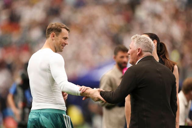 (260615) -- HOUSTON, June 15, 2026 -- Manuel Neuer (L), goalkeeper of Germany, talks to Bastian Schweinsterger after the group E match between Germany and Curacao at the 2026 FIFA World Cup, WM, Weltmeisterschaft, Fussball at Houston Stadium in Houston, the United States, June 14, 2026. ) (SP)U.S.-HOUSTON-FOOTBALL-FIFA WORLD CUP-GROUP E-GER VS CUW LixMing 