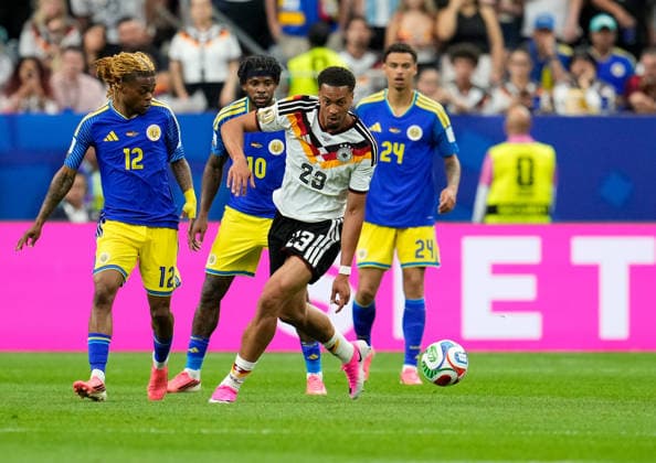 Sontje Hansen Curacao, 12 , Leandro Bacuna Curacao, 10 , Felix Nmecha Germany, 23 , and Deveron Fonville Curacao, 24 USA, FIFA World Cup, Germany vs Curacao, Houston, 14 06 2026 USA, FIFA World Cup, Germany vs Curacao, Houston, 14 06 2026 Houston Copyright: xEibner-Pressefoto ScottxColemanx EP_SCN