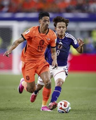 ARLINGTON - (lr) Donyell Malen of the Netherlands and Takefusa Kubo of Japan during the FIFA 2026 World Cup Group F match between the Netherlands and Japan at Dallas Stadium on June 14, 2026, in Arlington, United States. ROBIN VAN LONKHUIJSEN ANP FIFA World Cup, WM, Weltmeisterschaft, Fussball 2026 2026 xVIxANPxSportx xxANPxIVx 561022425 originalFilename: 561022425.jpg