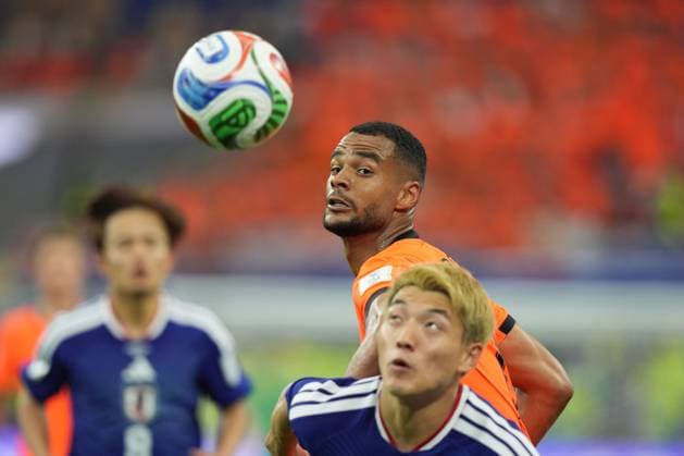 Cody Gakpo of Netherlands and Ritsu Doan of Japan Netherlands v Japan, 2026 FIFA World Cup, WM, Weltmeisterschaft, Fussball Group F, Football, Dallas Stadium, Arlington, Texas, USA - 14 Jun 2026Arlington Dallas Stadium Texas (TX) United States of America EDITORIAL USE ONLY No use with unauthorised audio, video, data, fixture lists, club league logos or live services. Online in-match use limited to 120 images, no video emulation. No use in betting, games or single club league player publications.  Copyright: xIsmaelxAdnan Shutterstockx 16927680bb
