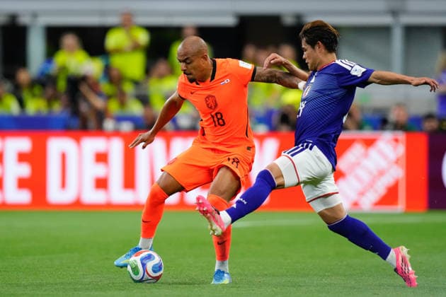 Netherlands v Japan: Group F - FIFA World Cup, WM, Weltmeisterschaft, Fussball 2026 Donyell Malen of Netherlands and Kaishu Sano of Japan compete for the ball during the FIFA World Cup 2026 Group F match between Netherlands and Japan at Dallas Stadium on June 14, 2026 in Dallas, Texas. Dallas TX United States  Copyright: xJosexBretonx originalFilename:bretonhernandez-netherla260614_nppCb.jpg