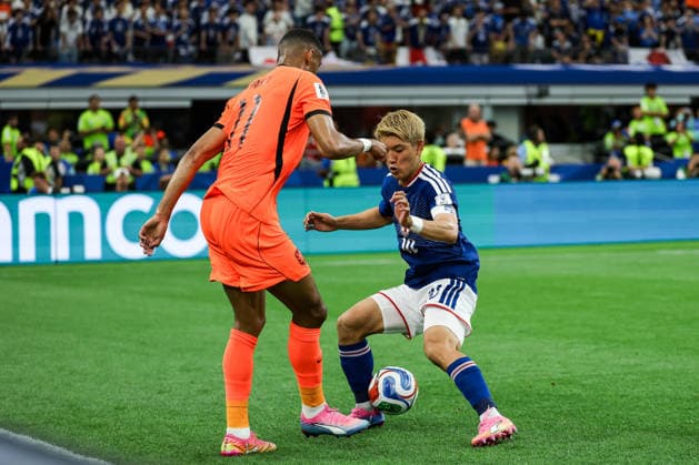 Cody Gakpo of Netherlands (L) passes the ball under pressure from Ritsu Doan of Japan (R) during a FIFA Men’s World Cup 2026 Group Stage football match between Netherlands and Japan at Dallas Stadium, in Arlington on June 14th 2026 (Photo by Leo Barrilari SPP)  Copyright: xLeoxBarrilari SPPx Sportspressphoto_SPR166592