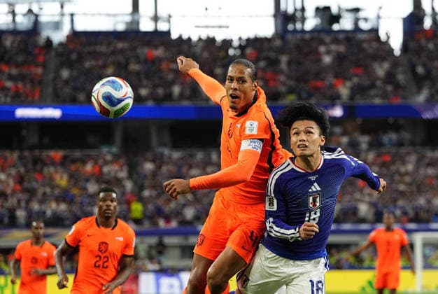 Virgil van Dijk Netherlands and Ayase Ueda Japan battle for the ball during Netherlands and Japan, Group F FIFA World Cup 2026, Dallas Stadium, Arlington, United States on June 14, 2026 Thor Wegner DeFodi Images Photo by DeFodi Images