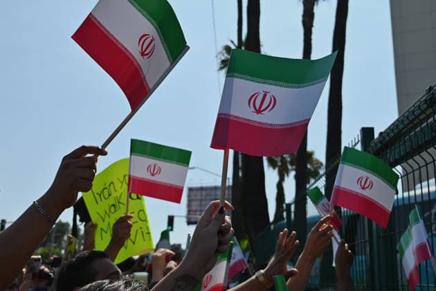 Iran team departs for World Cup match in Tijuana TIJUANA, MEXICO - JUNE 14: Iran fans wait for the team to leave for US outside the Marriott Hotel on Sunday, June 14, 2026 in Tijuana, Mexico, on the eve of their 2026 World Cup Group G match against New Zealand on Monday in Southern California, USA. Carlos Moreno Anadolu Tijuana Mexico. Editorial use only. Please get in touch for any other usage.  Copyright: x2026xAnadoluxCarlosxMorenox