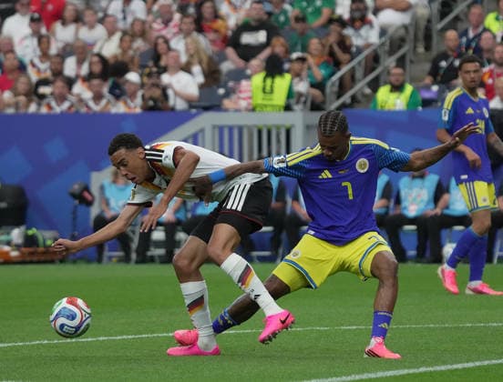14 06 2026, Houston Stadium, Houston, USA, World Cup FIFA 2026, preliminary round, Germany vs Curacao, in the picture Jamal Musiala Germany , Juninho Bacuna Curacao Photo by Hasan Bratic DeFodi Images
