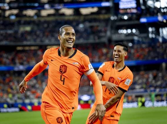 ARLINGTON - (lr) Virgil van Dijk of the Netherlands, Tijjani Reijnders of the Netherlands celebrate the 1-0 during the 2026 FIFA World Cup, WM, Weltmeisterschaft, Fussball Group F match between the Netherlands and Japan at Dallas Stadium on June 14, 2026, in Arlington, United States. KOEN VAN WEEL ANP FIFA World Cup 2026 2026 xVIxANPxSportx xxANPxIVx 561032483 originalFilename: 561032483.jpg