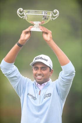 CALEDON, ON - JUNE 14: Sudarshan Yellamaraju of Canada lifts the trophy for best Canadian after the final round of the RBC Canadian Open 2026 at TPC Toronto at Osprey Valley North Course on June 14, 2026 in Caledon, Ontario. (Photo by Julian Avram Icon Sportswire) GOLF: JUN 14 PGA, Golf Herren RBC Canadian Open EDITORIAL USE ONLY Icon2606140052