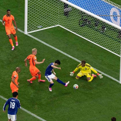 June 14, 2026, Arlington, Texas, USA: Japanese players 1 GK ZION SUZUKI and 3 D SHOGO TANIGUCHI working together to protect the ball from the Netherlands Arlington USA - ZUMAm147 20260614_zap_m147_016 Copyright: xHossxMcBainx