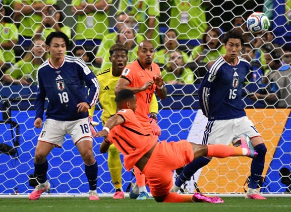 (260615) -- DALLAS, June 15, 2026 -- Cody Gakpo (front) of the Netherlands competes during the group F match between the Netherlands and Japan at the 2026 FIFA World Cup, WM, Weltmeisterschaft, Fussball at the Dallas Stadium in Dallas, the United States, on June 14, 2026. ) (SP)U.S.-DALLAS-FOOTBALL-FIFA WORLD CUP-GROUP F-NED VS JPN WuxXiaoling 