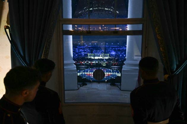 US President Donald Trump hosts UFC Freedom 250 at the White House US marines observe the view of the UFC Freedom 250 mixed martial arts event on the South Lawn, as seen from the Blue Room Balcony of the White House in Washington, DC, USA, 14 June 2026. The event is taking place on the 80th birthday of US President Donald Trump. Washington District of Columbia United States  Copyright: xSAULxLOEBx xPOOLx