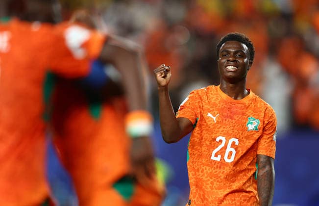 Philadelphia, USA, 14th June 2026. Christ Inao Oulai of Ivory Coast celebrates after Amad Diallo (not pictured) of Ivory Coast scores to make it 1-0 during the Ivory Coast vs Ecuador FIFA World Cup, WM, Weltmeisterschaft, Fussball match at Lincoln Financial Field, Philadelphia. Picture credit should read: Paul Terry Sportimage EDITORIAL USE ONLY. No use with unauthorised audio, video, data, fixture lists, club league logos or live services. Online in-match use limited to 120 images, no video emulation. No use in betting, games or single club league player publications. SPI_064_PT_Ivory_Coast_Ecuador SPI-4836-0064